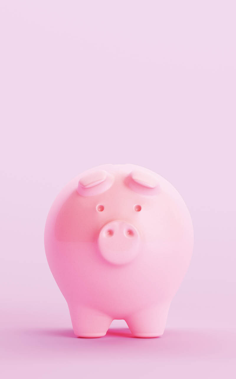 Ein rosa Sparschwein steht vor einem einfarbigen hellrosa Hintergrund. Beschreibung von KI generiert